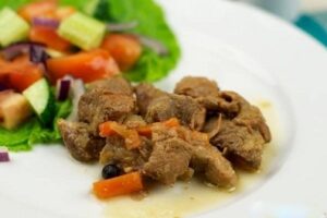 Тушкована свинина