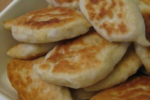 Смажені пиріжки з яйцями