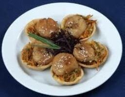 Морський гребінець відвареної в соусі