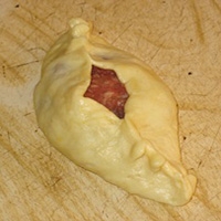 розтягаї