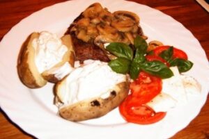 Антрекот з цибулею