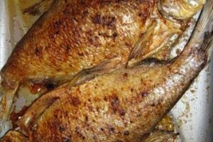 Лящ, печений на багатті