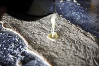 пласт тіста з маслом