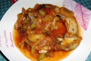 Сом в грибному соусі