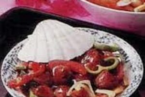 Морські гребінці в чорному бобовом соусі