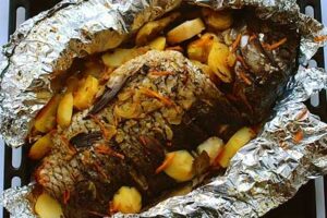 Річковий окунь з помідорами