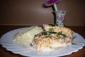 Лящ в часниковому соусі