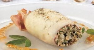 Кальмари фаршировані грибами