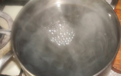 Каструля з окропом для варіння пшона