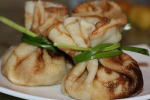 Мішечки з млинців з грибами